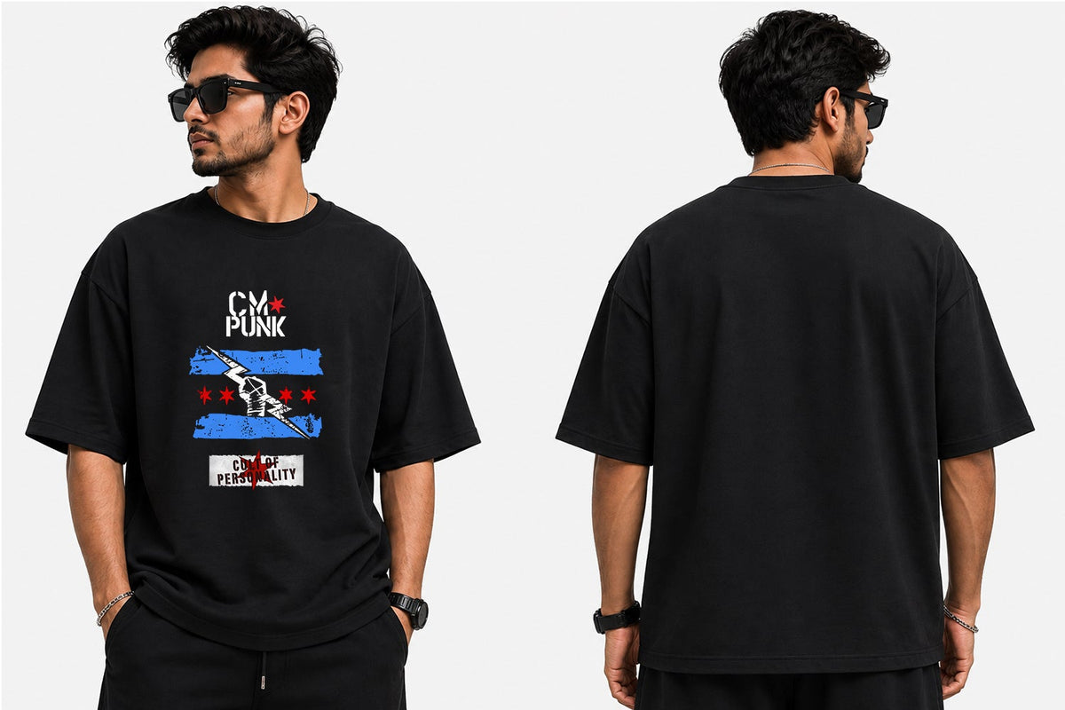 A man modeling a black short-sleeve graphic T-shirt shown from both front and back views against a light gray background. The front features a colorful chest graphic with the text 'CM Punk' and a red, white, and blue striped design.