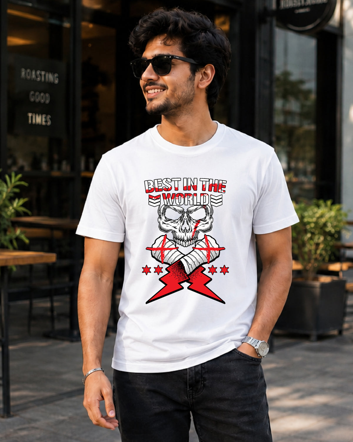 Best in the World skull wrestling inspired white graphic t-shirt with skull artwork, taped fists and lightning graphics front view | WrestleHub India